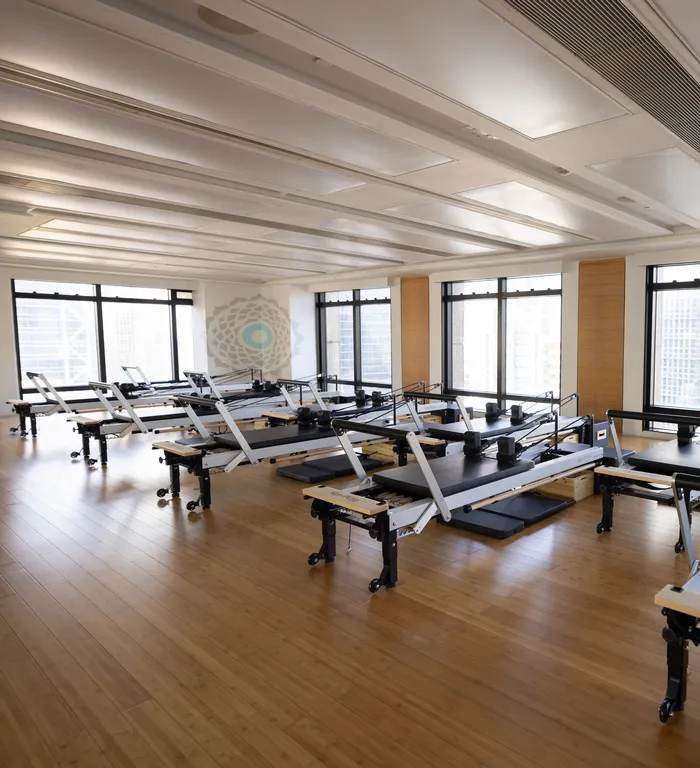 Soundwill Plaza: Reformer Pilates equipment in a bright studio.