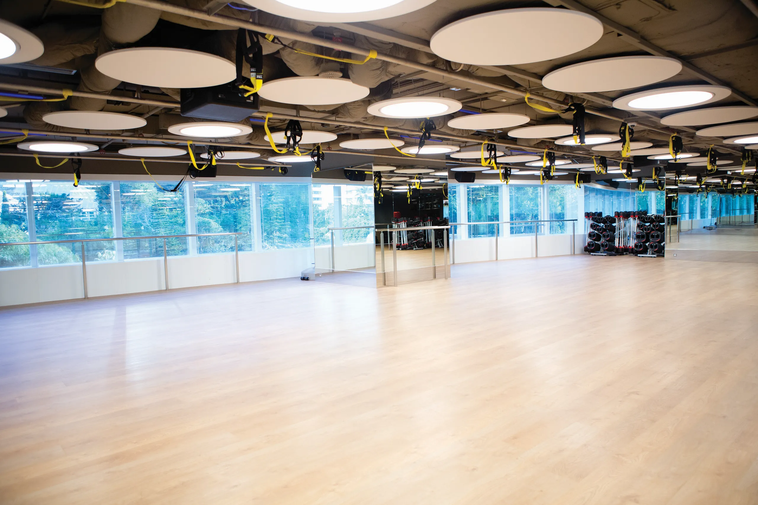ICBC Tower: Group exercise studio with patterned ceiling lights.