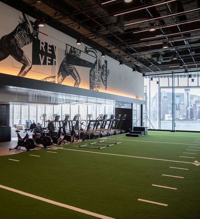 K11 MUSEA: Functional training space with turf and equipment.